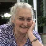 Ruth Buckingham resting her chin on her hand, smiling